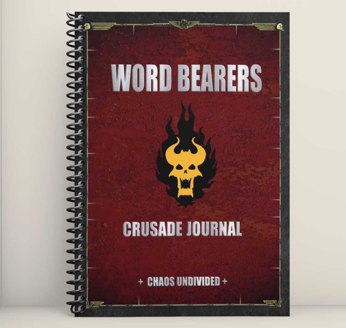 Word Bearers Crusade Journal Spiral Bound Book propped up against a white background on a white counter